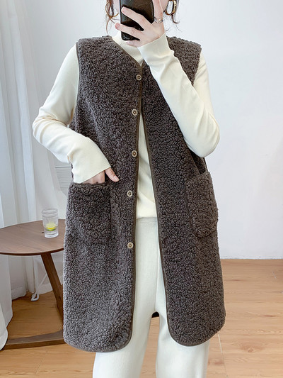 Naiste pikk nööpide ja taskutega sulevest