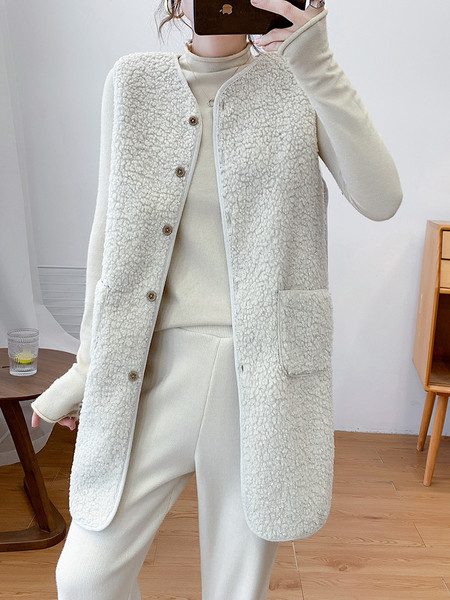 Naiste pikk nööpide ja taskutega sulevest