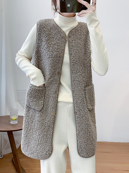 Naiste pikk nööpide ja taskutega sulevest