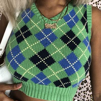 Lühikese mudeliga naiste ruuduline vest