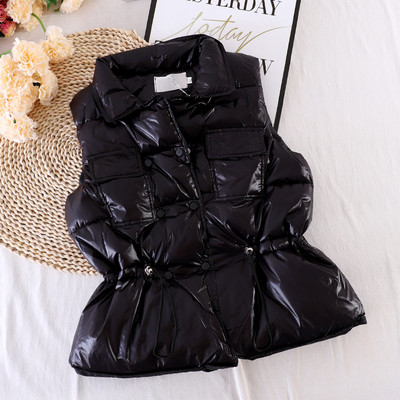 Naiste vest taskute ja elastse vöökohaga