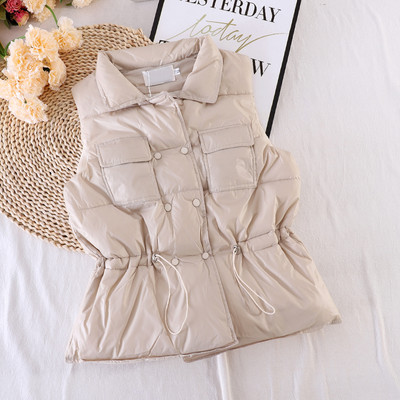 Naiste vest taskute ja elastse vöökohaga