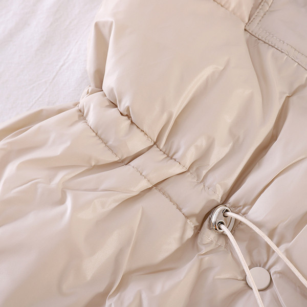 Naiste vest taskute ja elastse vöökohaga