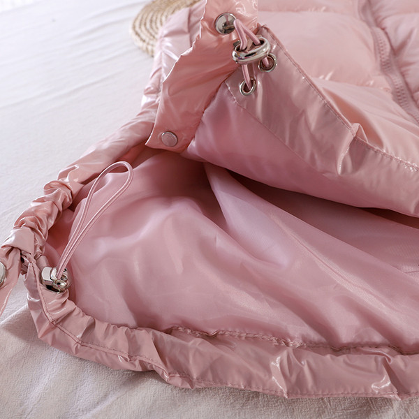 Uus mudel kapuutsiga ja taskutega naiste vest