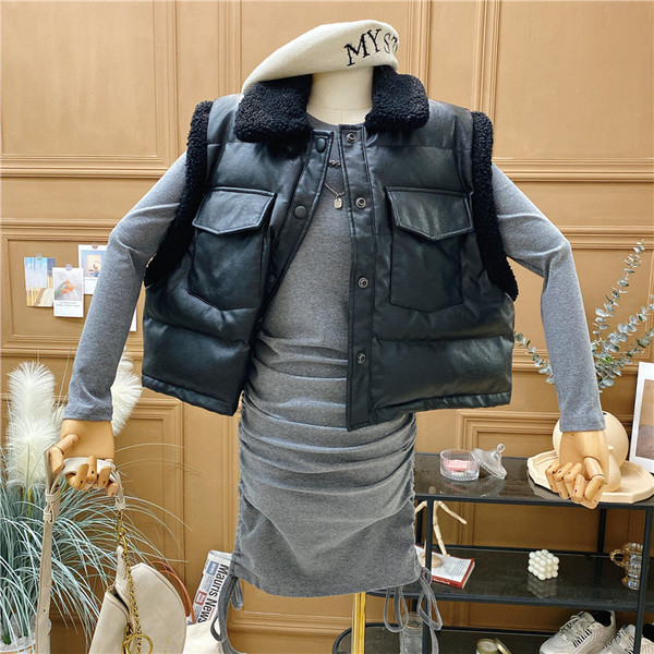 Naujo modelio moteriška eko odos liemenė su sagomis ir kišenėmis