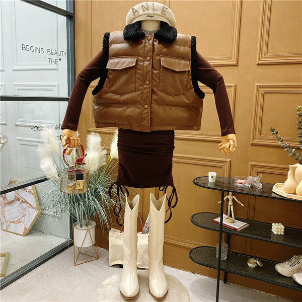 Naujo modelio moteriška eko odos liemenė su sagomis ir kišenėmis