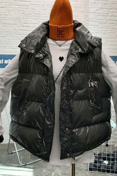 Naiste moodne kõrge krae ja taskutega vest