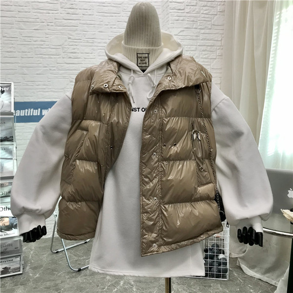 Naiste moodne kõrge krae ja taskutega vest