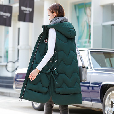 Pikk naiste sügis-talvine vest kapuutsi ja taskutega