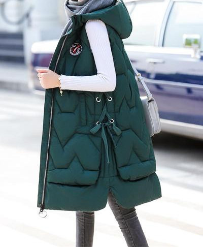 Pikk naiste sügis-talvine vest kapuutsi ja taskutega