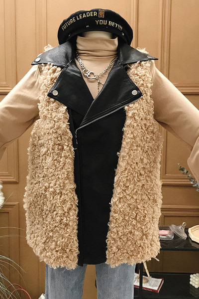 Novi model ženskog perjanog prsluka sa kožnim detaljima