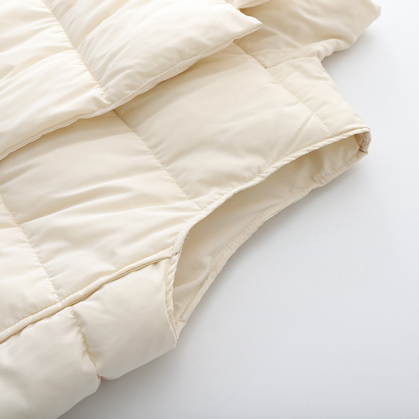 Keskmise pikkusega nööpidega sügis-talvine vest