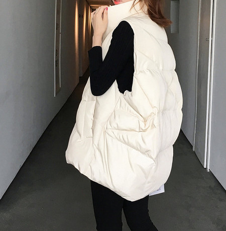 Γυναικείο γιλέκο φαρδύ μοντέλο με ψηλό κολάρο και κουμπιά