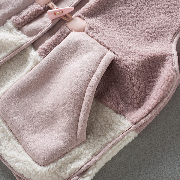 Naiste nööpidega sulevest