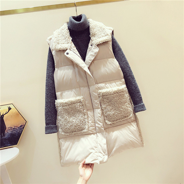 Paprasta moteriška ilga liemenė su kišenėmis ir sagomis