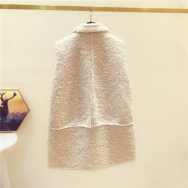 Paprasta moteriška ilga liemenė su kišenėmis ir sagomis