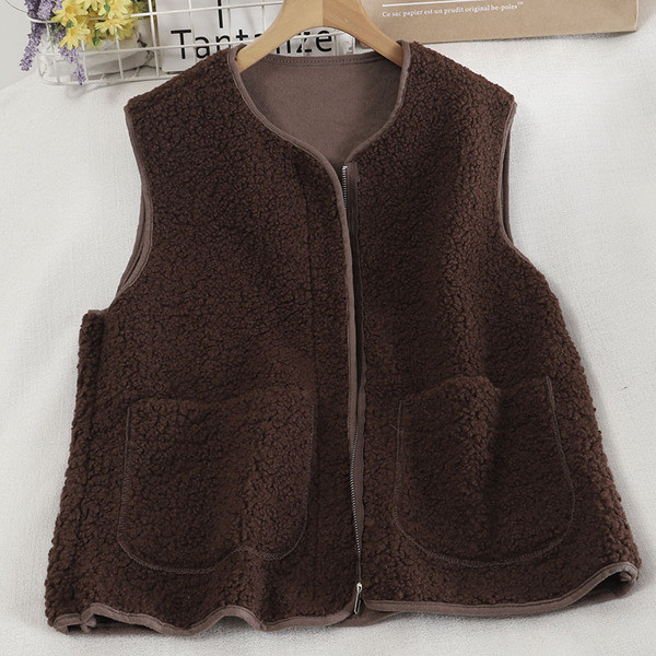 Moodne naiste vest luku ja taskutega