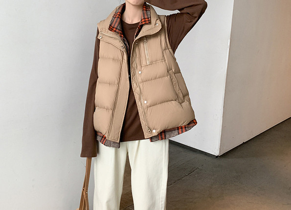 Naiste sügis-talvise vesti lai mudel