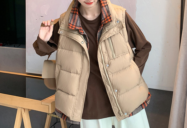 Naiste sügis-talvise vesti lai mudel