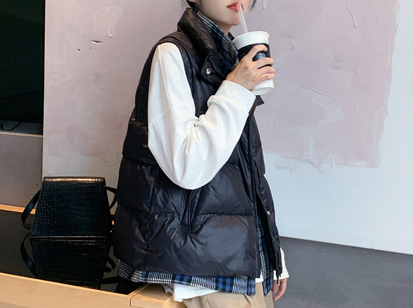 Naiste sügis-talvise vesti lai mudel