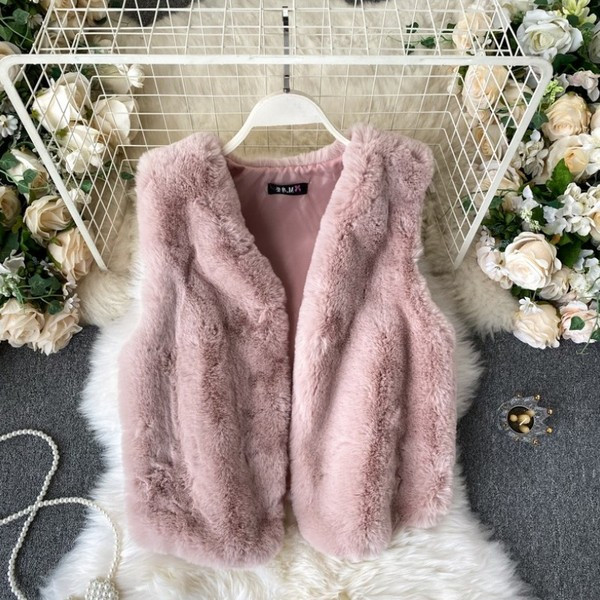 Ženska zimska puhasta vesta sa špic izrezom