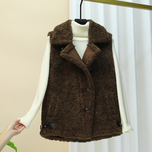 Moderna sieviešu veste ar špica kakla izgriezumu un kabatu