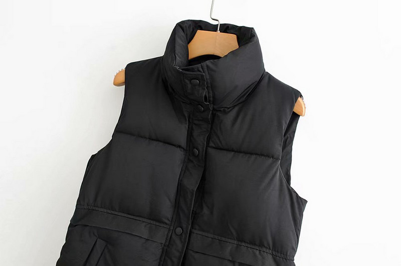 Sügis-talvine vest nööpide ja taskutega