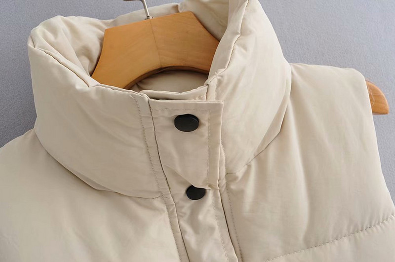 Sügis-talvine vest nööpide ja taskutega