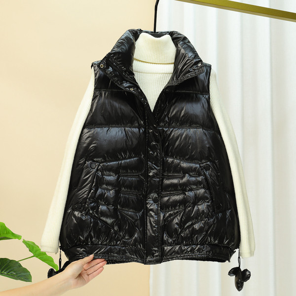 Laia mudeliga naiste vest kõrge krae ja taskutega