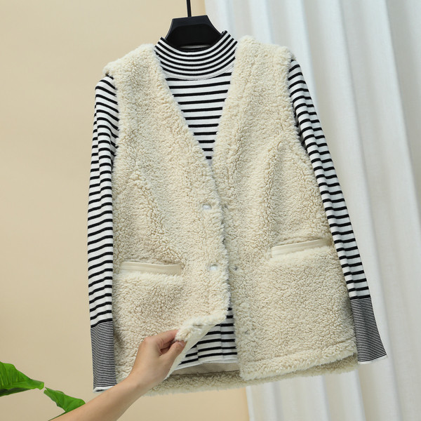 Uue mudeli naiste pehme vest spits-kaelusega ja taskutega