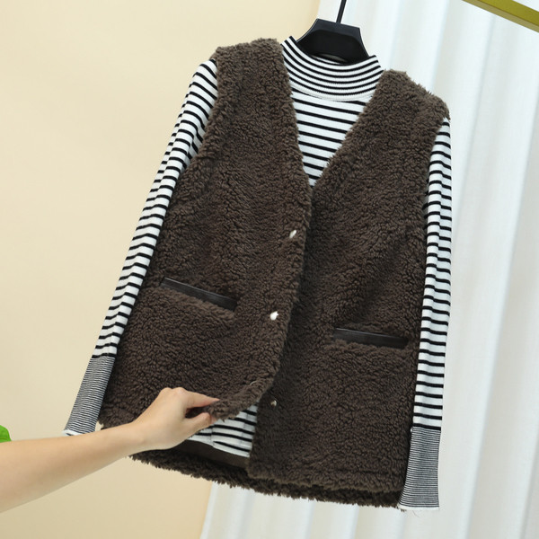 Uue mudeli naiste pehme vest spits-kaelusega ja taskutega