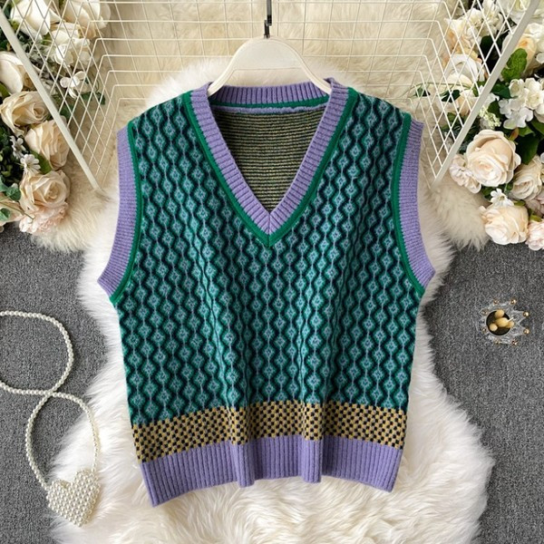 Megzta moteriška liemenė V formos iškirpte