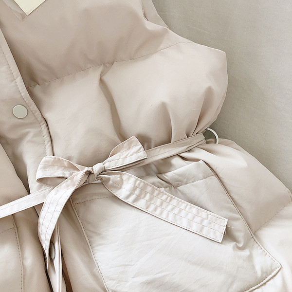 Naiste vabaaja vest vöö ja nööpidega