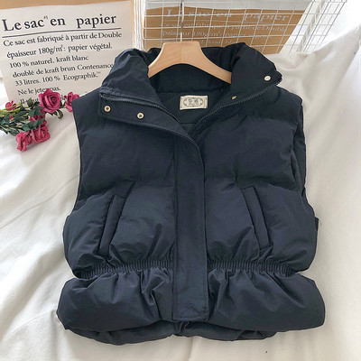 Naiste lühike kõrge krae ja taskutega vest