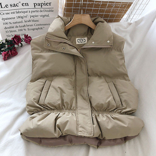 Naiste lühike kõrge krae ja taskutega vest