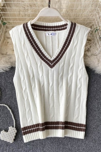 Naiste spitsikaelusega kootud vest