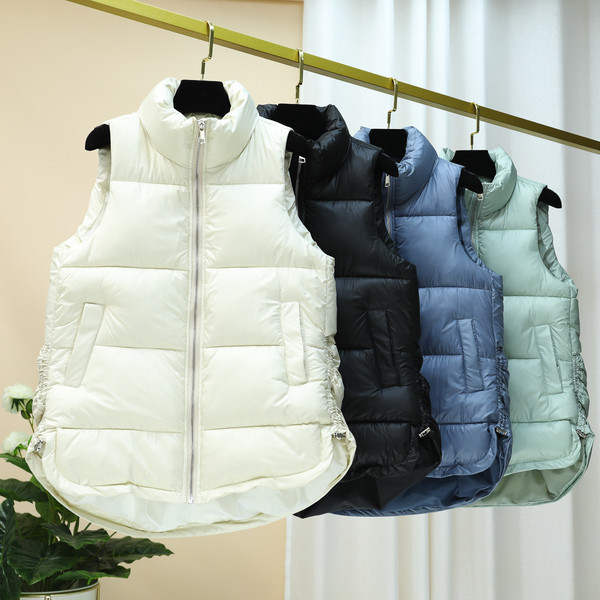 Naiste pikk kõrge kraega vest - asümmeetriline mudel