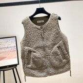 Naiste vabaaja sulevest taskute ja lukuga