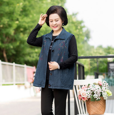 Naiste teksapüks pehme seelikuvestiga, värvilise tikandiga