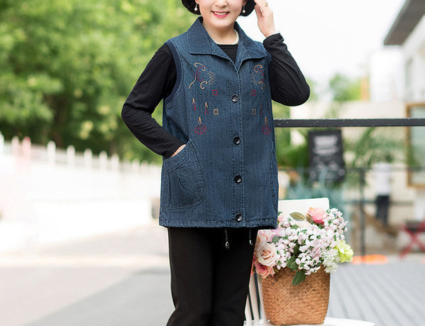 Naiste teksapüks pehme seelikuvestiga, värvilise tikandiga