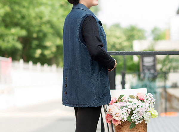 Naiste teksapüks pehme seelikuvestiga, värvilise tikandiga