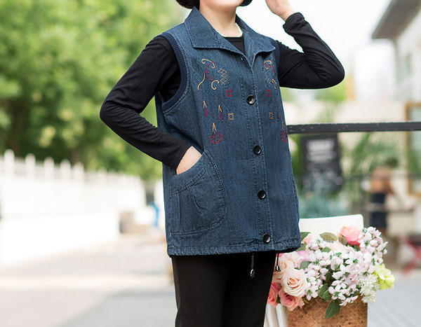 Naiste teksapüks pehme seelikuvestiga, värvilise tikandiga