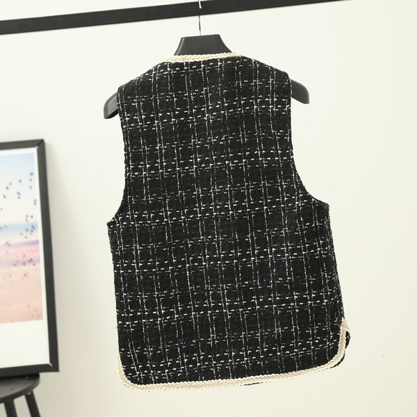 Nööpide ja spitsikaelusega naiste vest