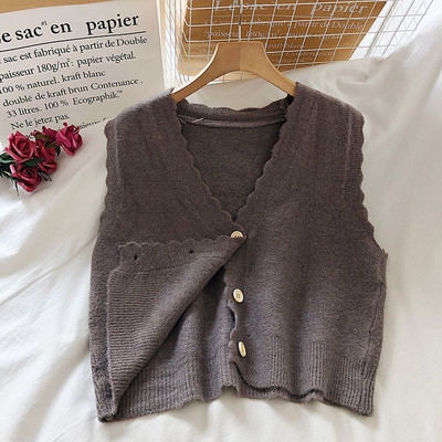 Naiste talvevest nööpide ja spitsikaelusega