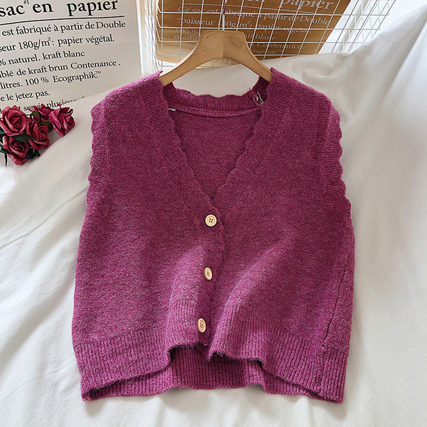 Naiste talvevest nööpide ja spitsikaelusega