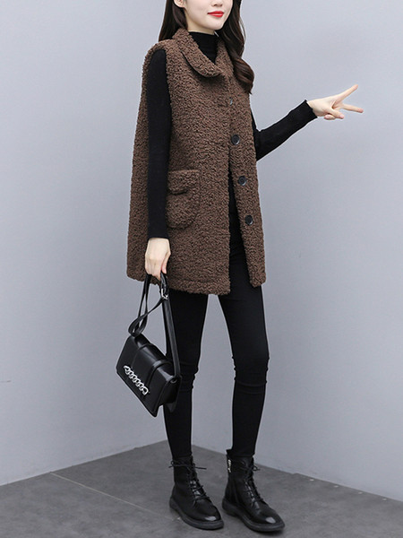 Moodne naiste vest krae ja taskutega