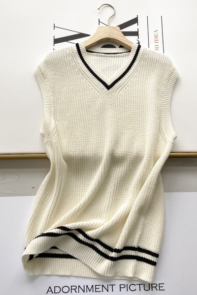 Pikk igapäevane spitsikaelusega vest