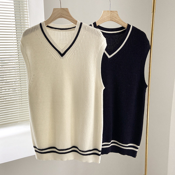 Pikk igapäevane spitsikaelusega vest