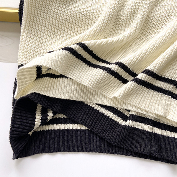 Pikk igapäevane spitsikaelusega vest