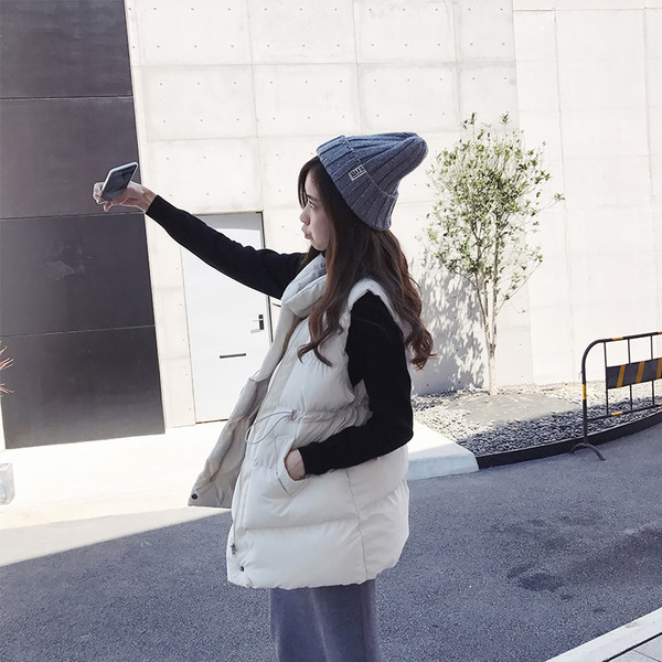 Naiste vabaajavest kõrge krae ja vöökohaga sidemetega